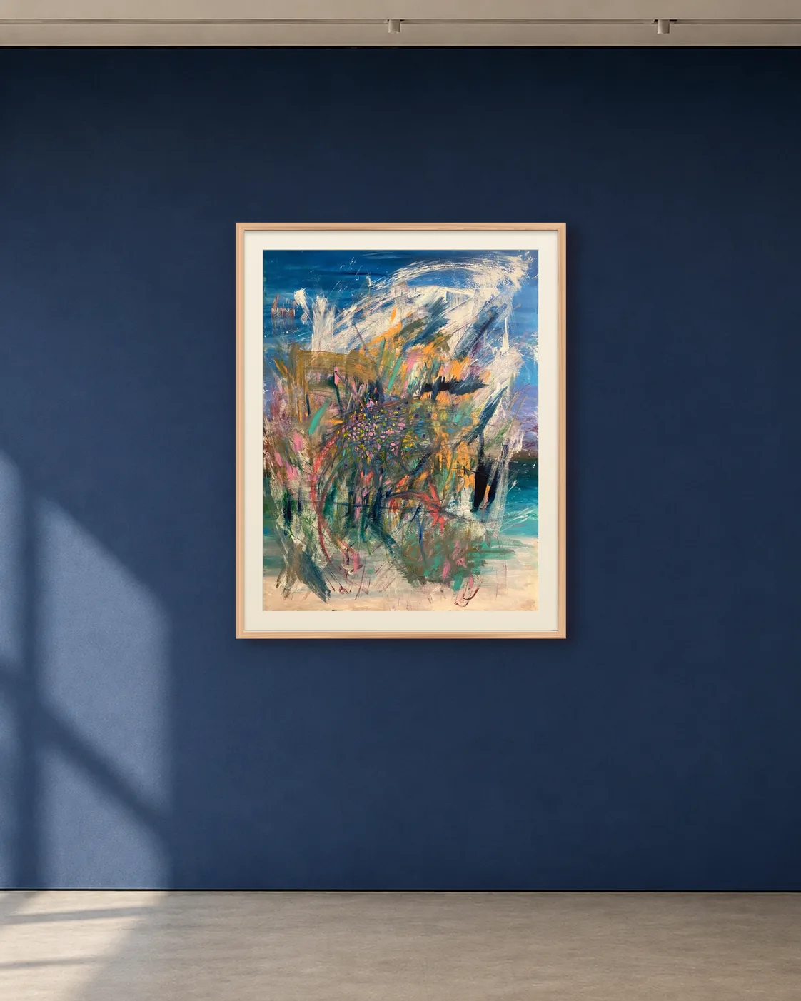 Blue Surge shown framed on a deep blue gallery wall