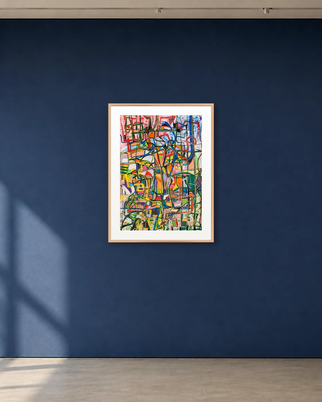 Color Grid Current shown framed on a deep blue gallery wall